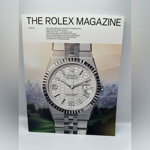Rolex Magazine with Silver and White Cover